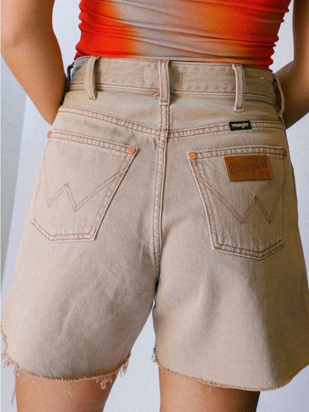 Wrangler Women’s High-Waist Frayed Hem Shorts in Faded Taupe